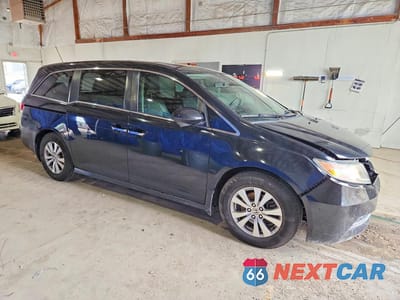 Czwarte zdjęcie samochodu z boku: 2014 HONDA ODYSSEY EXL VIN:5FNRL5H63EB107556 - miniatura