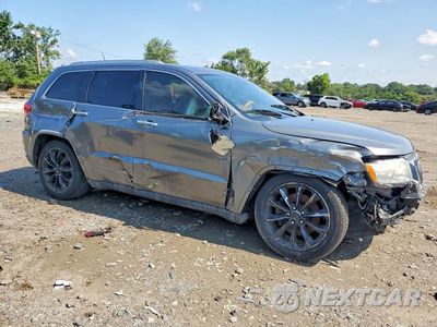 Czwarte zdjęcie samochodu z boku: 2011 JEEP GRAND CHEROKEE OVERLAND VIN:1J4RR6GTXBC709711 - miniatura