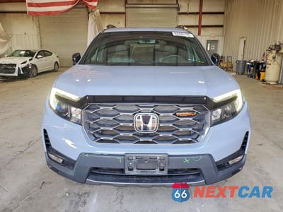 Piąte zdjęcie samochodu w środku: 2022 HONDA PASSPORT TRAIL SPORT VIN:5FNYF8H66NB024725 - miniatura
