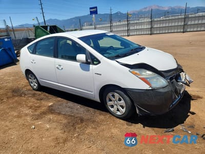Czwarte zdjęcie samochodu z boku: 2006 TOYOTA PRIUS BASE VIN:JTDKB20U767528779 - miniatura