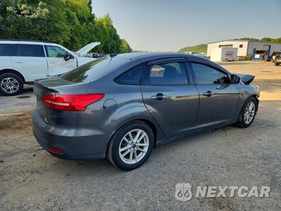Trzecie zdjęcie samochodu z tyłu: 2016 FORD FOCUS SE VIN:1FADP3F24GL210879 - miniatura