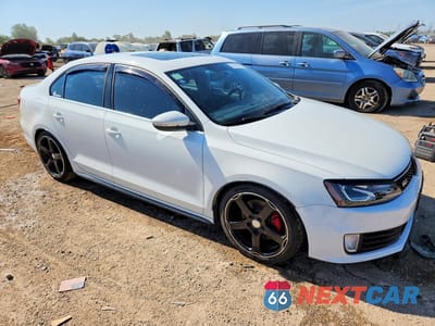 Czwarte zdjęcie samochodu z boku: 2013 VOLKSWAGEN JETTA GLI VIN:3VW4S7AJ2DM299518 - miniatura