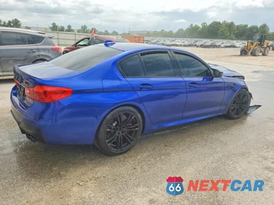 Trzecie zdjęcie samochodu z tyłu: 2022 BMW M5 VIN:WBS83CH06NCK64273 - miniatura