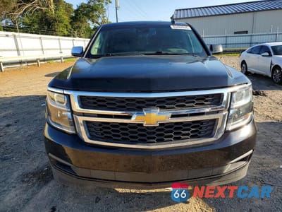 Piąte zdjęcie samochodu w środku: 2018 CHEVROLET SUBURBAN C1500 LT VIN:1GNSCHKC4JR143804 - miniatura