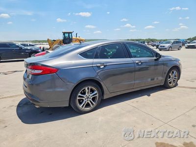 Trzecie zdjęcie samochodu z tyłu: 2018 FORD FUSION SE VIN:3FA6P0HD7JR176550 - miniatura