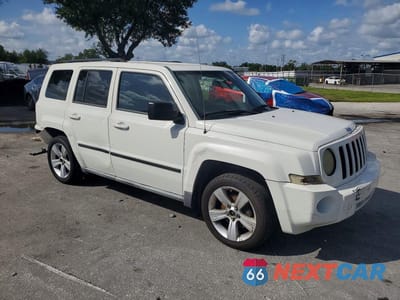 Czwarte zdjęcie samochodu z boku: 2010 JEEP PATRIOT SPORT VIN:1J4NT2GB2AD622040 - miniatura
