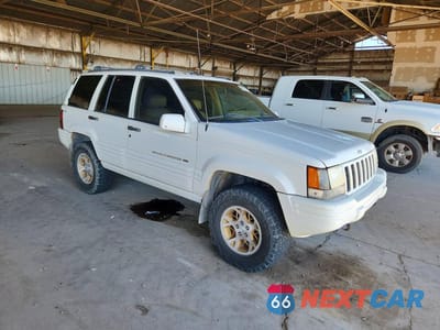 Czwarte zdjęcie samochodu z boku: 1998 JEEP GRAND CHEROKEE LIMITED VIN:1J4GZ78YXWC322296 - miniatura