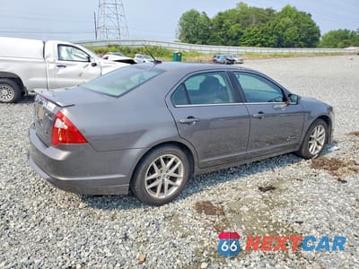 Trzecie zdjęcie samochodu z tyłu: 2010 FORD FUSION HYBRID VIN:3FADP0L37AR426990 - miniatura