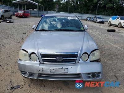 Piąte zdjęcie samochodu w środku: 2006 KIA OPTIMA LX VIN:KNAGD126X65462083 - miniatura