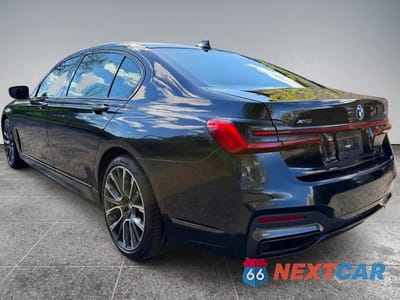 Trzecie zdjęcie samochodu z tyłu: 2022 BMW 740 XI VIN:WBA7T4C03NCK23662 - miniatura