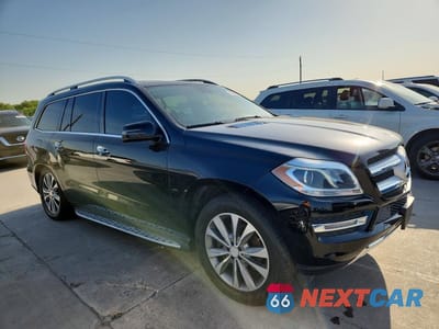 Czwarte zdjęcie samochodu z boku: 2014 MERCEDES-BENZ GL 450 4MATIC VIN:4JGDF7CE4EA414590 - miniatura