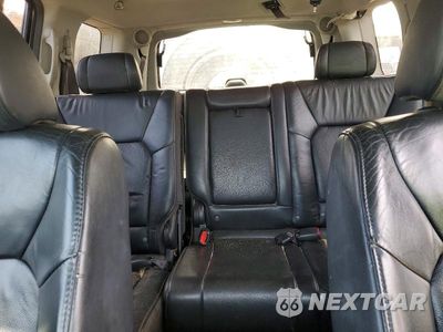 Zdjęcie 10 z 13 samochodu: 2011 HONDA PILOT EXL VIN:5FNYF4H64BB079355 - miniatura