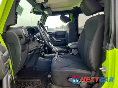 Zdjęcie 7 z 13 samochodu: 2013 JEEP WRANGLER SPORT VIN:1C4AJWAGXDL503037 - miniatura