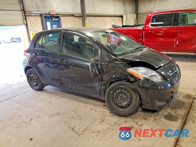 Czwarte zdjęcie samochodu z boku: 2009 TOYOTA YARIS BASE VIN:JTDKT903995277504 - miniatura