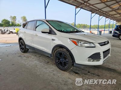 Czwarte zdjęcie samochodu z boku: 2016 FORD ESCAPE SE VIN:1FMCU9GX5GUA10708 - miniatura