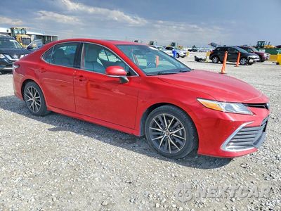 Czwarte zdjęcie samochodu z boku: 2023 TOYOTA CAMRY XLE VIN:4T1F31AK0PU054422 - miniatura