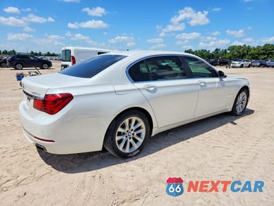 Trzecie zdjęcie samochodu z tyłu: 2014 BMW 740 LI VIN:WBAYE4C5XED138421 - miniatura