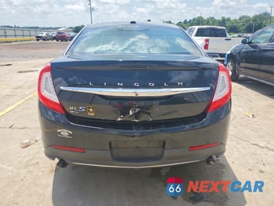 Zdjęcie 6 z 12 samochodu: 2015 LINCOLN MKS VIN:1LNHL9FT0FG600755 - miniatura