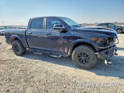 Czwarte zdjęcie samochodu z boku: 2017 RAM 1500 REBEL VIN:1C6RR7YT0HS671695 - miniatura