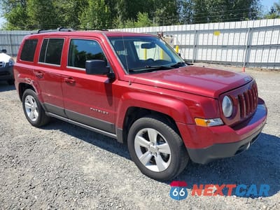 Czwarte zdjęcie samochodu z boku: 2014 JEEP PATRIOT LATITUDE VIN:1C4NJPFAXED509699 - miniatura