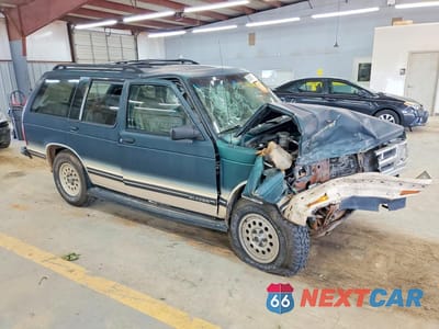 Czwarte zdjęcie samochodu z boku: 1993 CHEVROLET BLAZER S10 VIN:1GNDT13W8P2199576 - miniatura