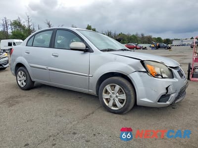 Czwarte zdjęcie samochodu z boku: 2011 KIA RIO LX VIN:KNADH4A35B6949373 - miniatura