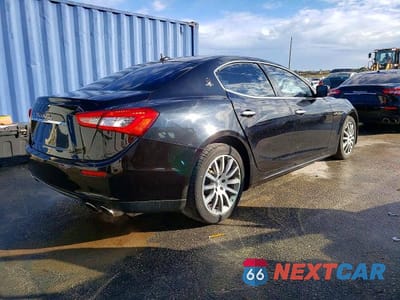 Trzecie zdjęcie samochodu z tyłu: 2014 MASERATI GHIBLI VIN:ZAM57XSAXE1128131 - miniatura