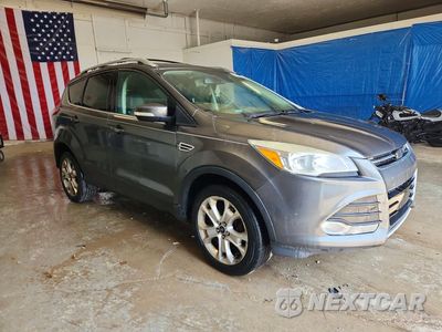 Czwarte zdjęcie samochodu z boku: 2015 FORD ESCAPE TITANIUM VIN:1FMCU9J9XFUC22707 - miniatura