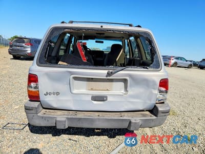 Zdjęcie 6 z 13 samochodu: 1995 JEEP GRAND CHEROKEE LAREDO VIN:1J4GZ58S5SC638375 - miniatura