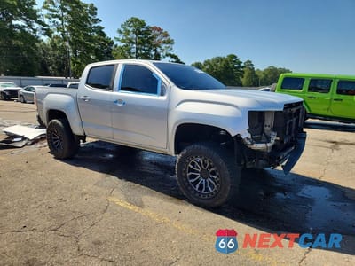 Czwarte zdjęcie samochodu z boku: 2018 GMC CANYON SLE VIN:1GTG5CEA1J1288769 - miniatura