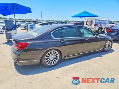 Trzecie zdjęcie samochodu z tyłu: 2019 BMW 740 I VIN:WBA7E2C58KB454438 - miniatura