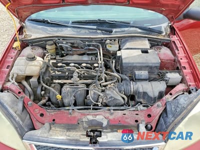 Zdjęcie 11 z 12 samochodu: 2005 FORD FOCUS ZX5 VIN:3FAFP37N35R148679 - miniatura