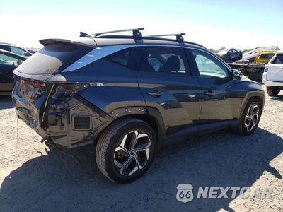 Trzecie zdjęcie samochodu z tyłu: 2022 HYUNDAI TUCSON LIMITED VIN:5NMJE3AE3NH156283 - miniatura