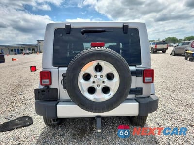 Zdjęcie 6 z 13 samochodu: 2014 JEEP WRANGLER SAHARA VIN:1C4AJWBG6EL258558 - miniatura