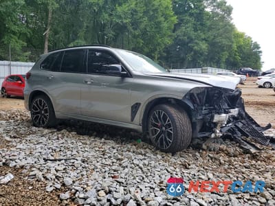 Czwarte zdjęcie samochodu z boku: 2023 BMW X5 VIN:5YMJU0C04P9P24811 - miniatura