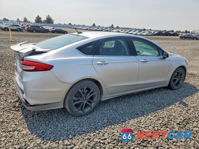 Trzecie zdjęcie samochodu z tyłu: 2018 FORD FUSION SE VIN:3FA6P0HD7JR214102 - miniatura