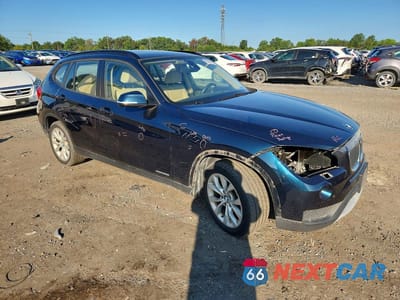 Czwarte zdjęcie samochodu z boku: 2014 BMW X1 XDRIVE28I VIN:WBAVL1C58EVY17170 - miniatura