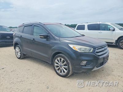 Czwarte zdjęcie samochodu z boku: 2017 FORD ESCAPE TITANIUM VIN:1FMCU9JD4HUA08139 - miniatura