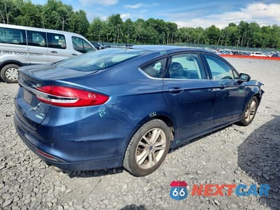 Trzecie zdjęcie samochodu z tyłu: 2018 FORD FUSION SE VIN:3FA6P0HD0JR174199 - miniatura