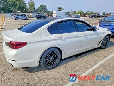 Trzecie zdjęcie samochodu z tyłu: 2019 BMW 530E VIN:WBAJA9C55KB399635 - miniatura