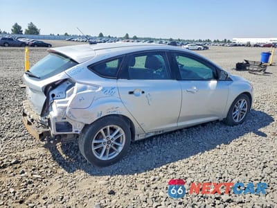 Trzecie zdjęcie samochodu z tyłu: 2016 FORD FOCUS SE VIN:1FADP3K21GL276294 - miniatura