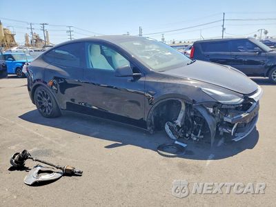 Czwarte zdjęcie samochodu z boku: 2023 TESLA MODEL Y VIN:7SAYGDEE9PA199071 - miniatura