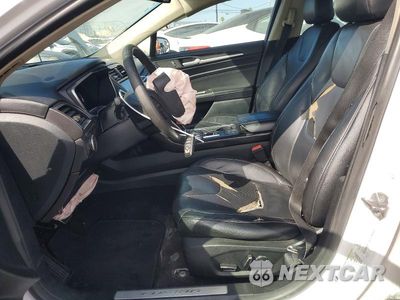 Zdjęcie 7 z 13 samochodu: 2017 FORD FUSION TITANIUM PHEV VIN:3FA6P0SU4HR350559 - miniatura