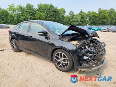 Czwarte zdjęcie samochodu z boku: 2018 FORD FOCUS SEL VIN:1FADP3H2XJL233765 - miniatura