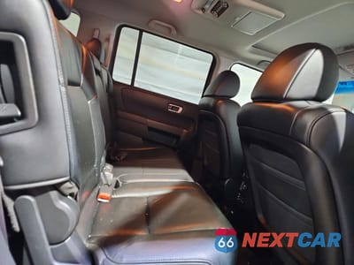 Zdjęcie 11 z 13 samochodu: 2011 HONDA PILOT EXL VIN:5FNYF4H62BB071755 - miniatura