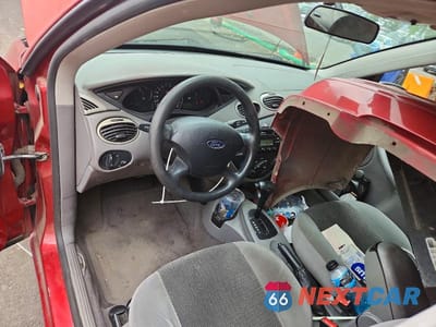 Zdjęcie 8 z 12 samochodu: 2003 FORD FOCUS LX VIN:1FAFP33Z83W302984 - miniatura