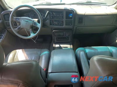 Zdjęcie 8 z 12 samochodu: 2003 GMC YUKON DENALI VIN:1GKEK63U73J170358 - miniatura
