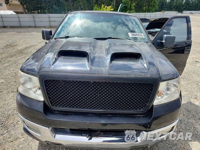 Zdjęcie 11 z 12 samochodu: 2004 FORD F150 VIN:1FTPX14524NB34989 - miniatura
