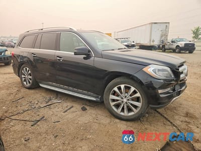Czwarte zdjęcie samochodu z boku: 2015 MERCEDES-BENZ GL 450 4MATIC VIN:4JGDF6EE1FA505034 - miniatura