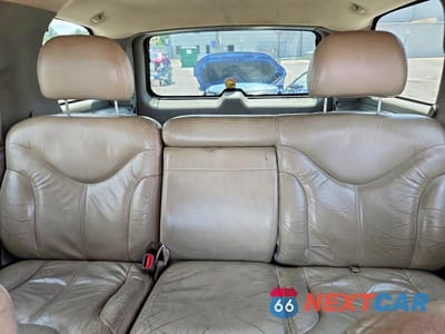 Zdjęcie 10 z 13 samochodu: 2001 GMC YUKON VIN:1GKEK13T11J229685 - miniatura
